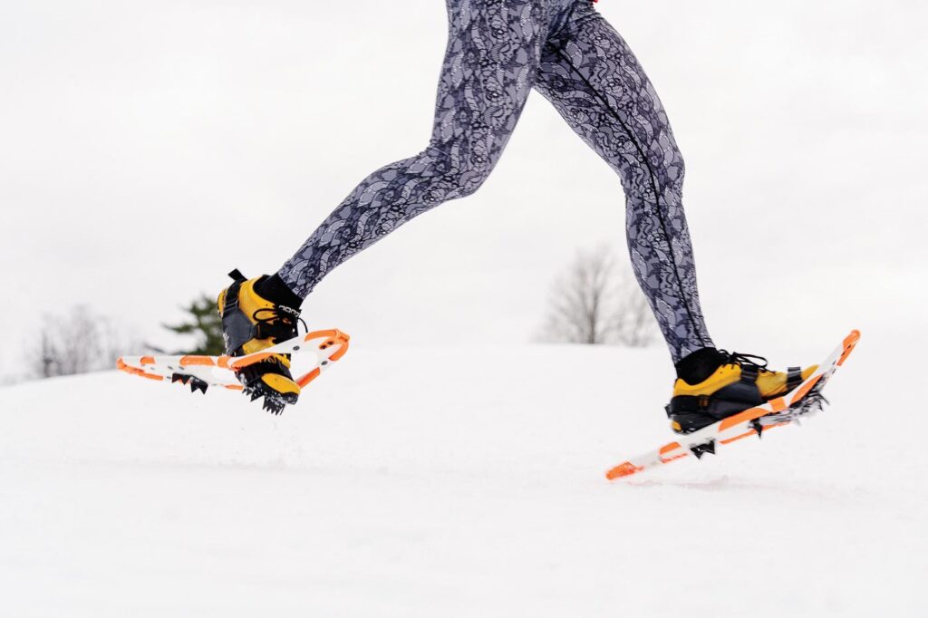 Jennifer Britz’s running in her running snowshoes