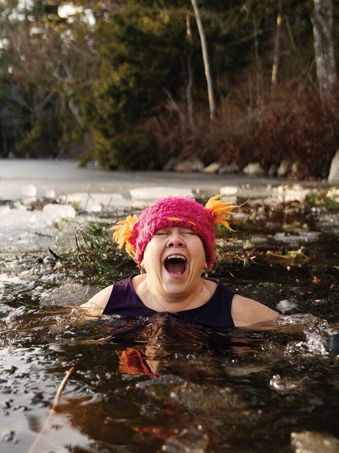 Rose Iuro-Damon dips into ice-covered Somes Pond