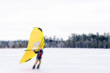 Tim Hynd and his kitewing skating on Compass Pond, near Baxter State Park