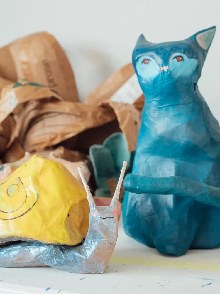 papier-mâché snail and cat