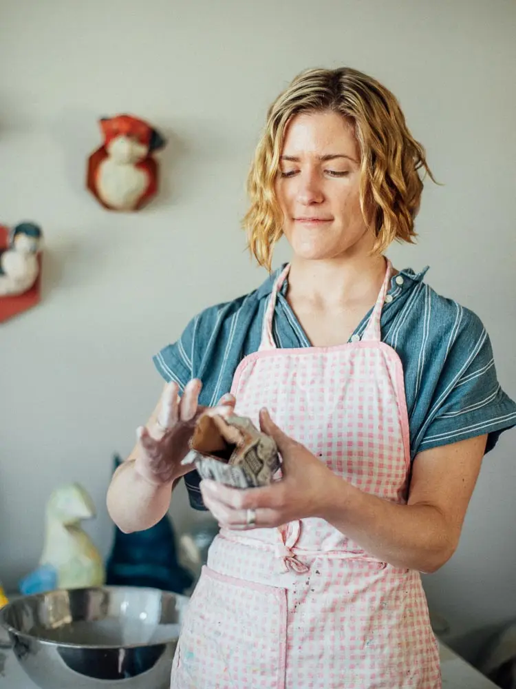 Hannah Berta working with papier-mâché