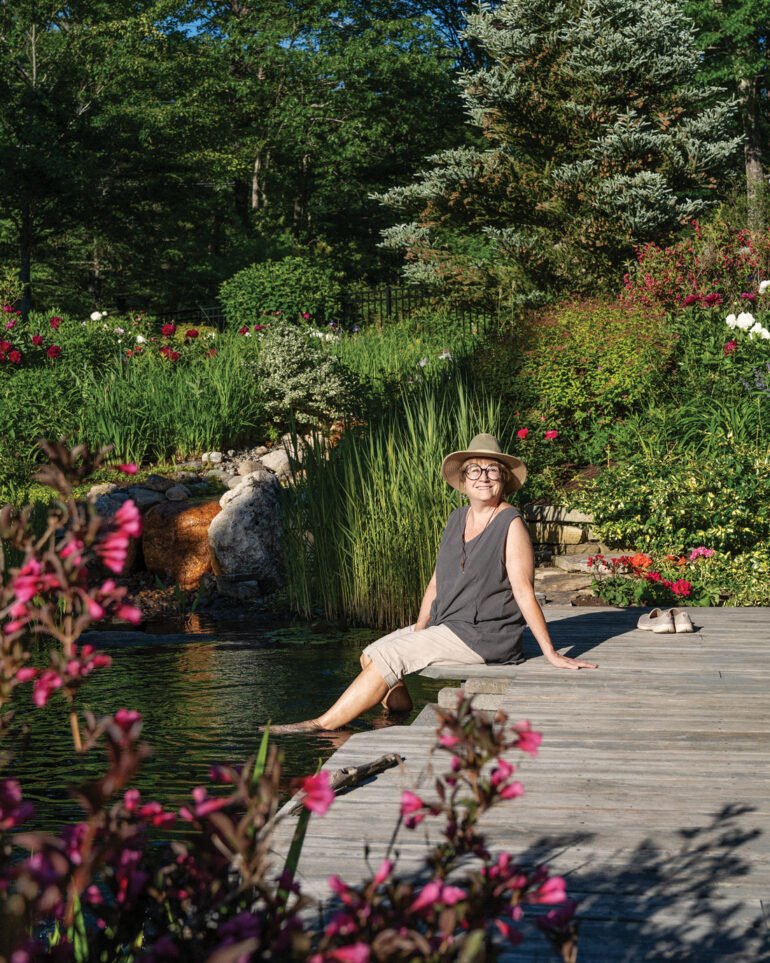 Avery Pierce relaxes by the natural pool at her Buxton, Maine, home
