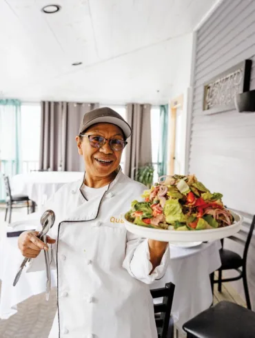 Lulu Ranta with a salad at The Quarry in Monson, Maine