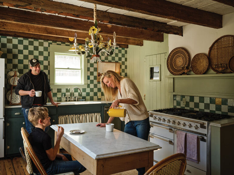 Christina Salway and John Moskowitz with family in the renovated kitchen of their circa 1800s farmhouse in Sedgewick, Maine