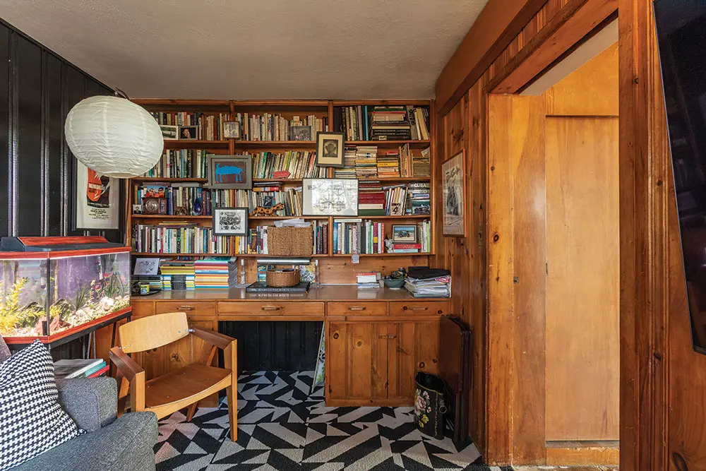 birch-plywood paneling in the den