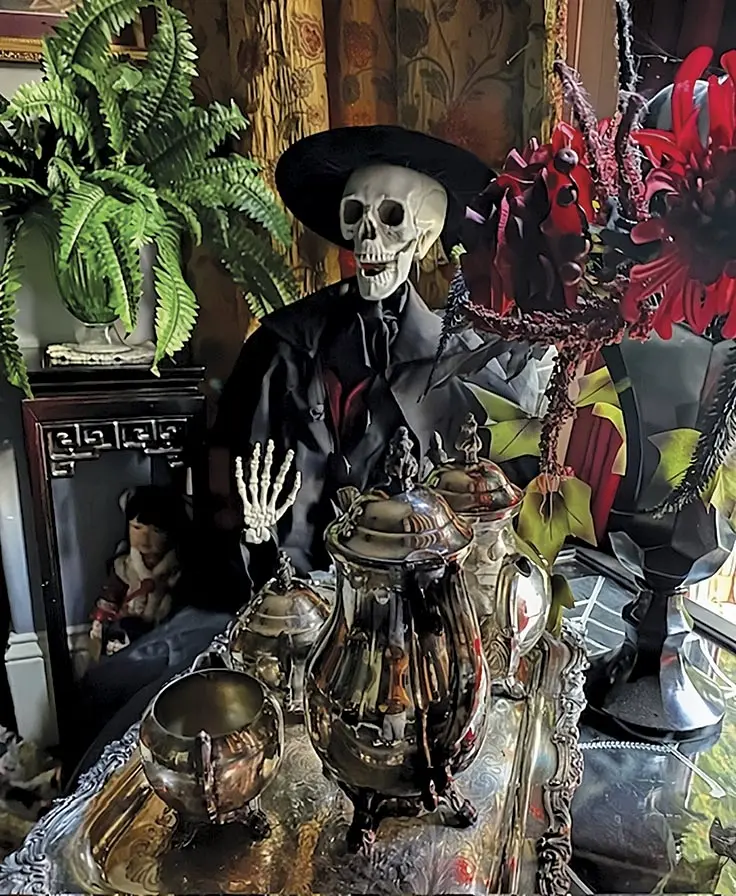 Migdalia Mass dressed-up a skeleton to complete a spooky scene in one of the rooms in her historic home