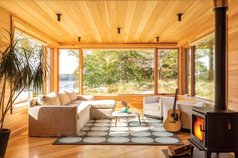 locally sourced pine paneling in a living area with a giant picture window