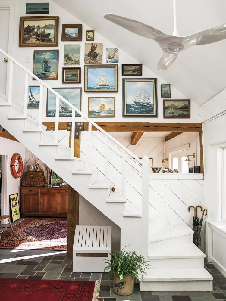 portraits unearthed in the property’s barn and local antiques shops are hung above the stairs