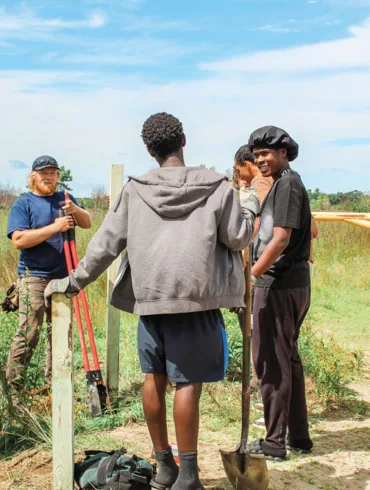 Members of the Tree Street Youth community and The Nature Conservancy in Maine staff recently worked together on a stewardship project at the Kennebunk Plains Preserve.