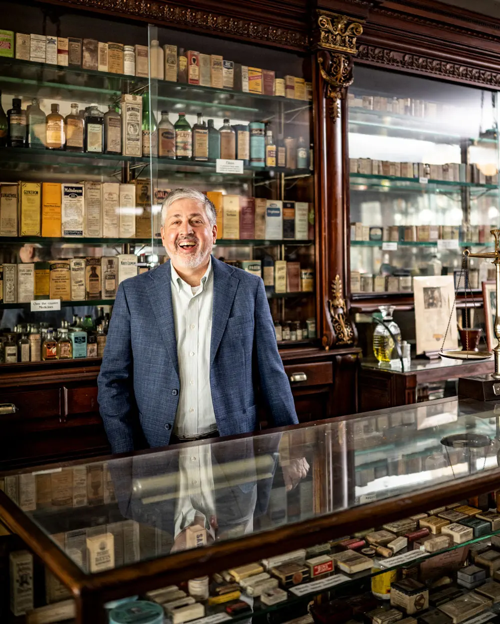 Waterville Historical Society president Jay Violette at the counter in the LaVerdiere Apothecary
