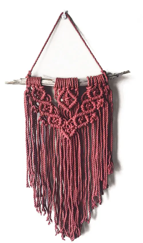 lacy macramé wall hanging by Shea Maritato