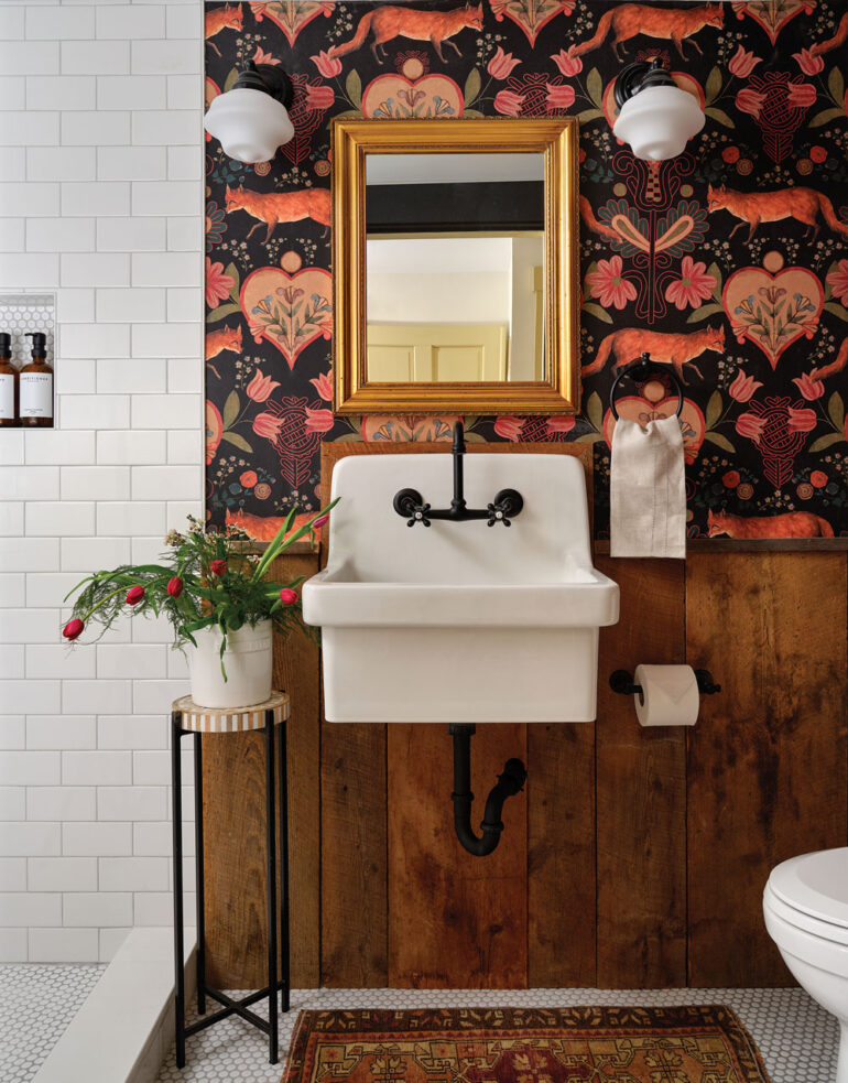 bold, gardeny MINDTHEGAP wallpaper in a powder room