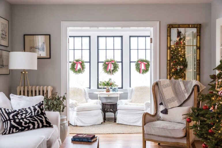 Marjanne Rademaker bought plain wreaths for the sunroom and other spots and dressed them up with her own ribbons