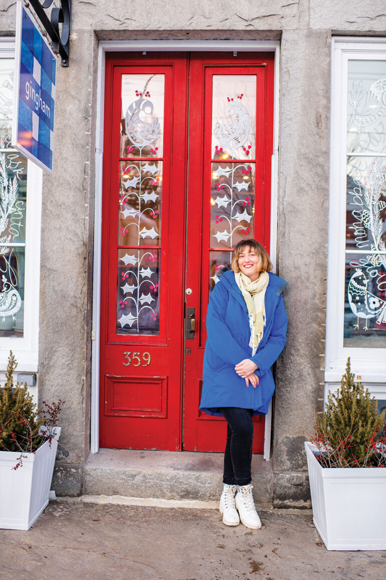 Lauren Berg and her whimsical window murals at Yarmouth clothing shop Gingham