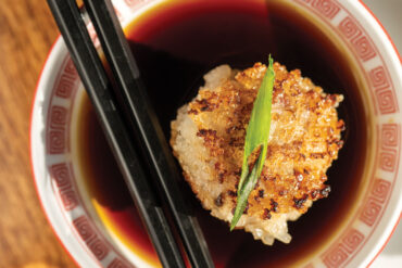Tao Yaun's new chef de cuisine Leon Vuong introduced crispy rice balls studded with pork, Chinese sausage, and shiitake to the menu