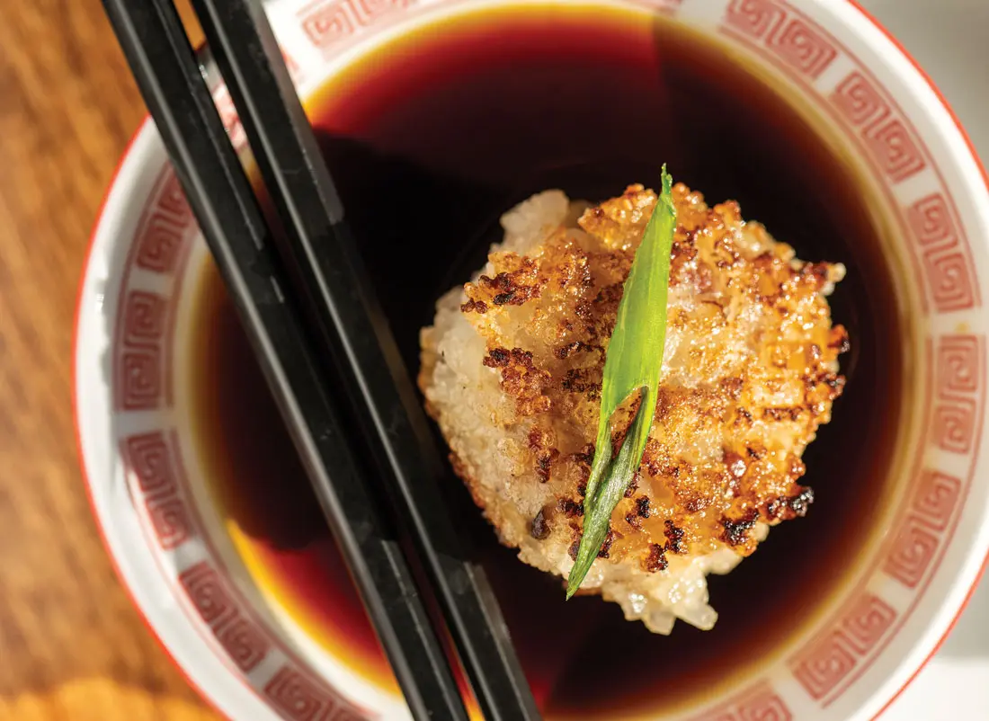 Tao Yaun's new chef de cuisine Leon Vuong introduced crispy rice balls studded with pork, Chinese sausage, and shiitake to the menu