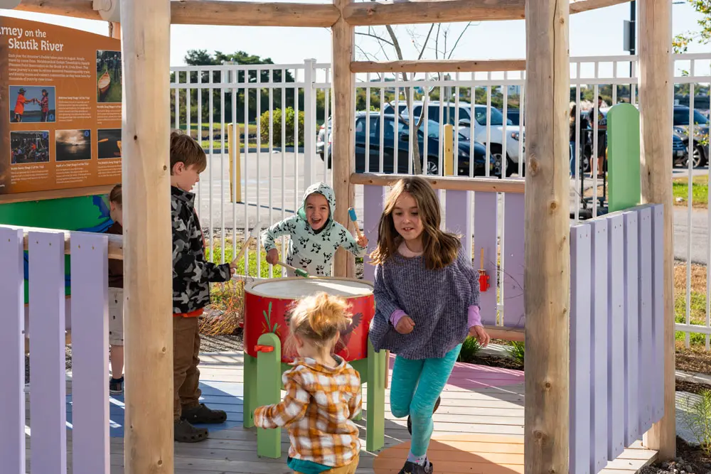 kids playing on Ckuwaponahkiyik Atkuhkakonol: Wabanaki Storytelling Through Art and Traditions exhibit and play space at the Children’s Museum & Theatre of Maine