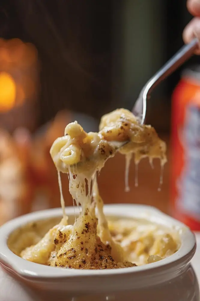 Stovetop mac and cheddar cheese that is assembled and crisped to order
