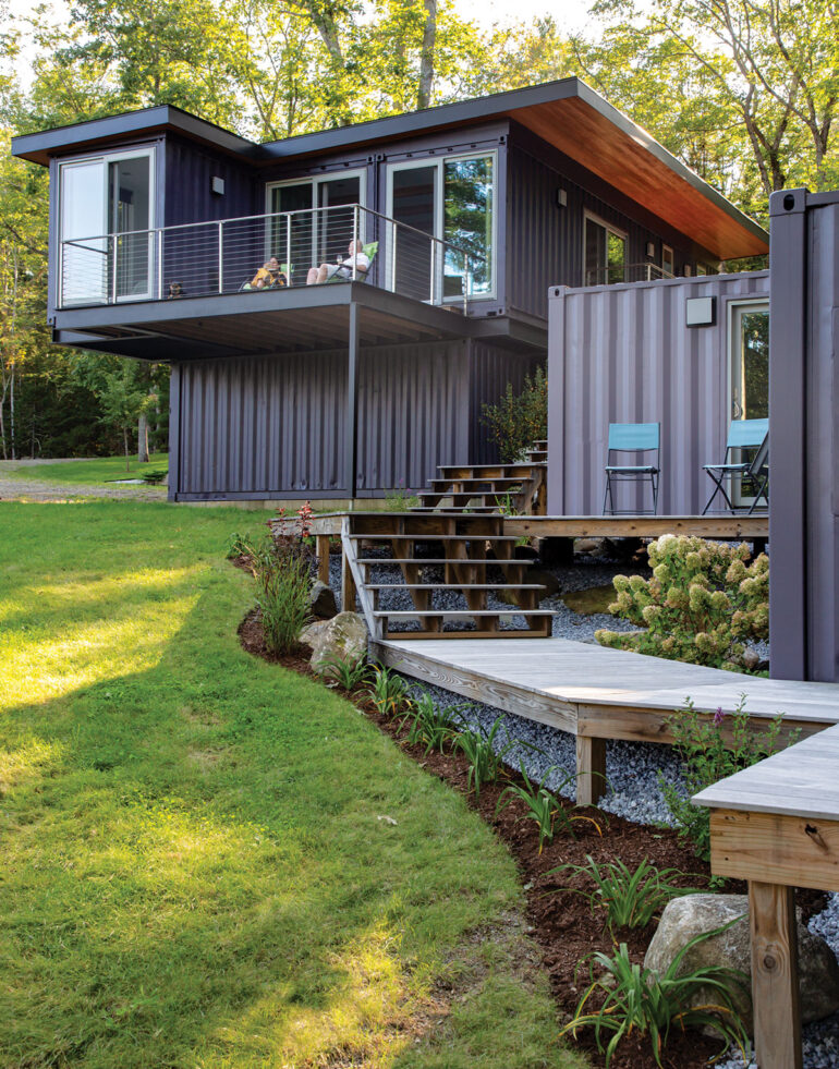 Douglas-fir soffits work with the bold paint job to warm the metal exterior of Liz and Todd Howard's shipping container home