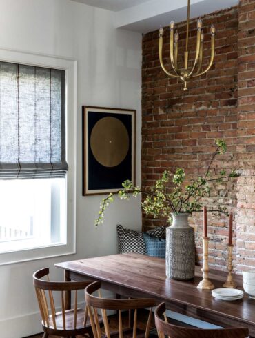 Portland furniture maker Kyle Kidwell’s tapered-leg, walnut McCormick table, and matching bench, anchor a cozy dining area designed by the city’s Tyler Karu.