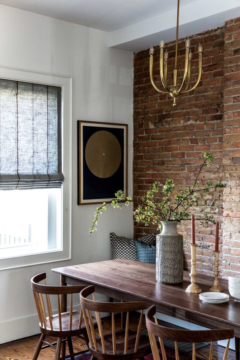 Portland furniture maker Kyle Kidwell’s tapered-leg, walnut McCormick table, and matching bench, anchor a cozy dining area designed by the city’s Tyler Karu.