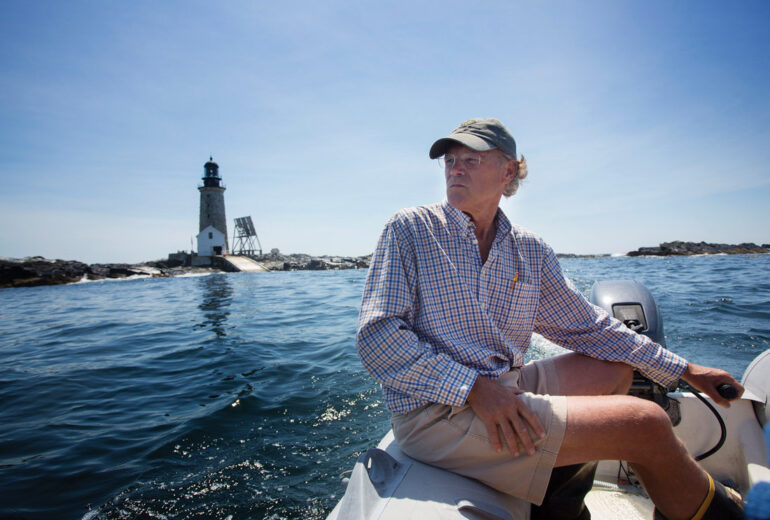 Ford Reiche in a boat near Halfway Rock Light