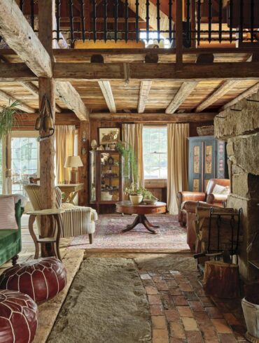 Stephanie and Bobby Masland’s 1819 dairy- barn-turned-home was moved from Minot to Harrison in 1999 and rebuilt with most of its original materials.