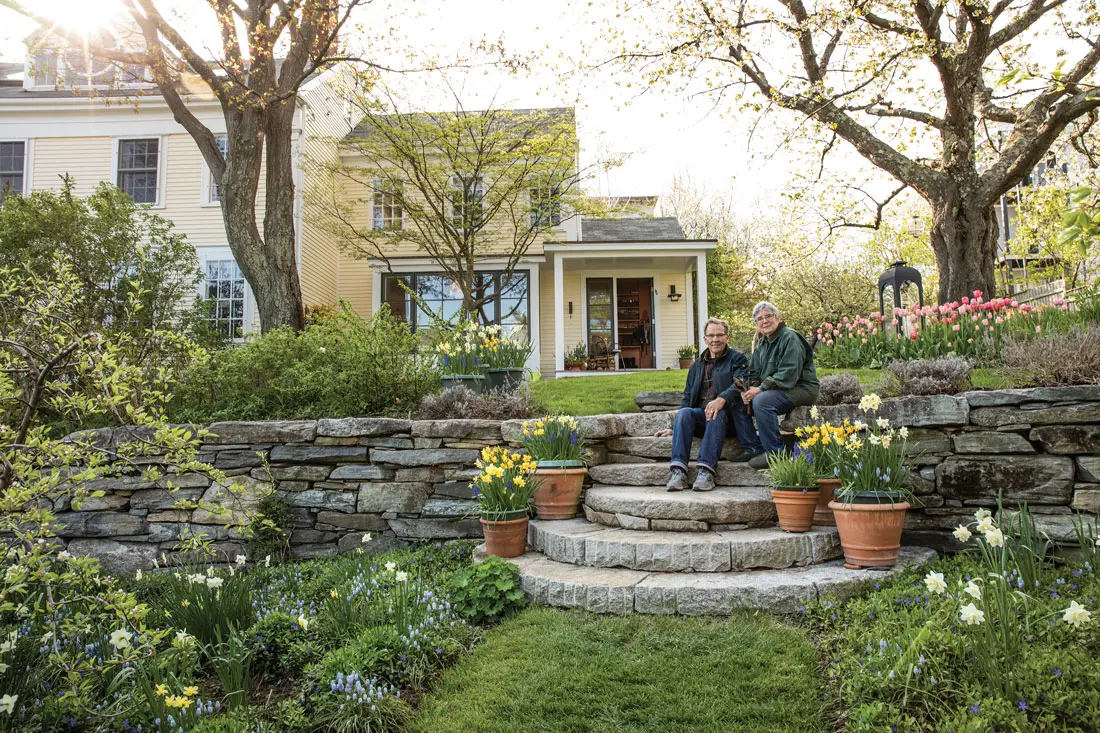 Robin and Rob Whitten in their sprawling Munjoy Hill garden