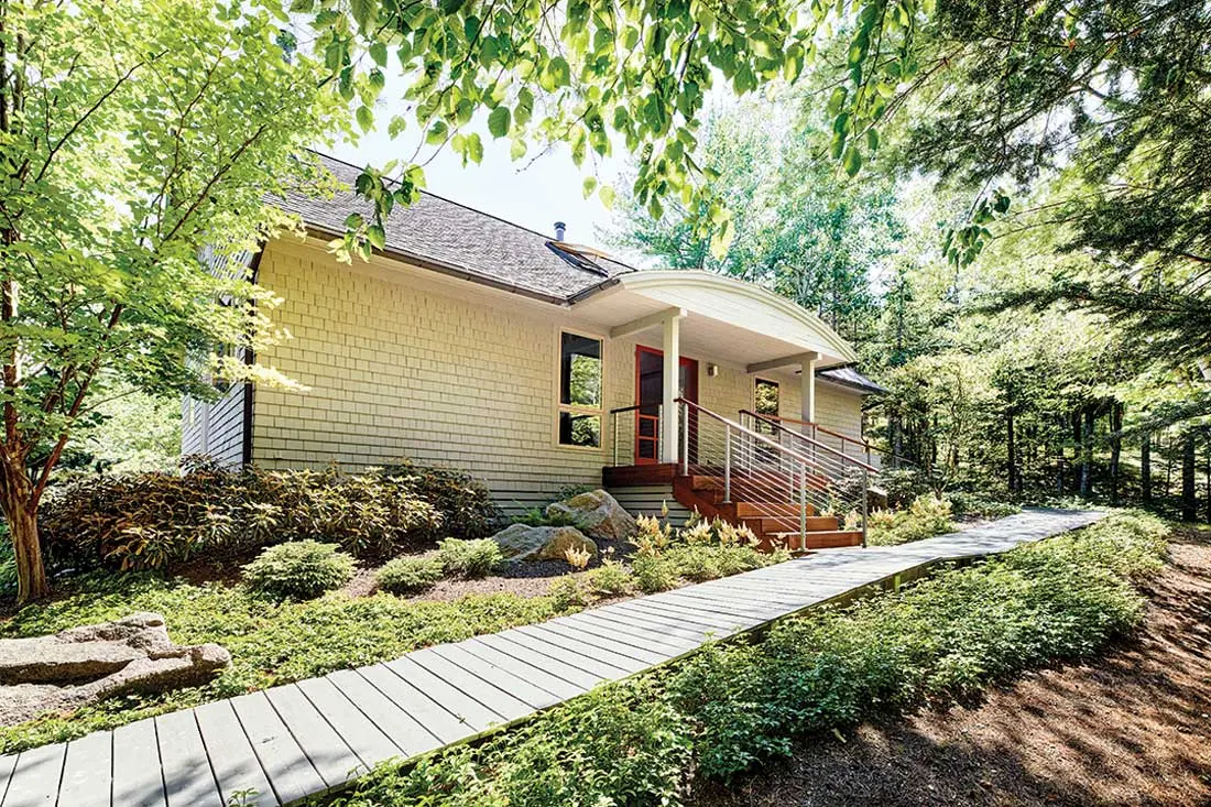 For an MDI Couple, One Renovation Led to Another Designed by Bar Harbor architect Roc Caivano, the home’s low-slung, cottagey shape belies the loftiness inside