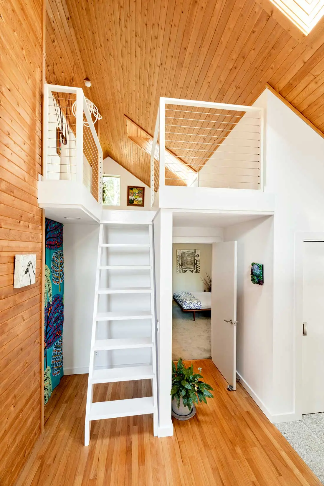 For an MDI Couple, One Renovation Led to Another White paint and new cable railing transformed the entrance to the loft guest bedroom/office above the owners’ suite.