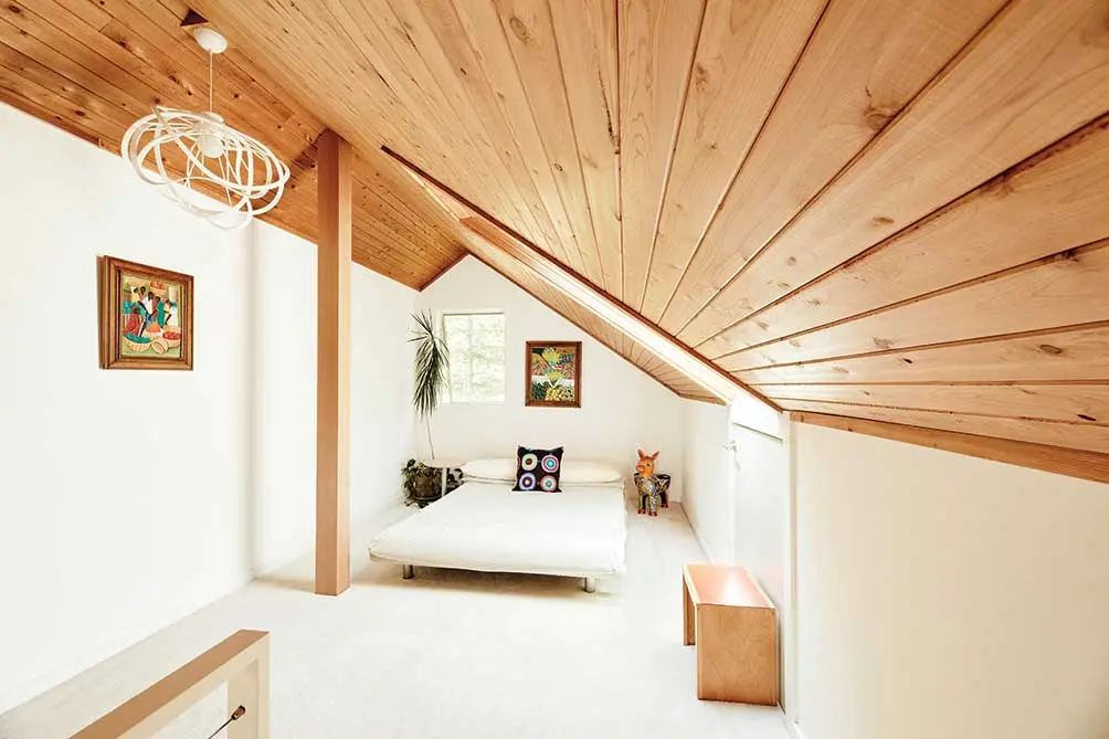 For an MDI Couple, One Renovation Led to Another Snowy carpeting in the loft guest room
