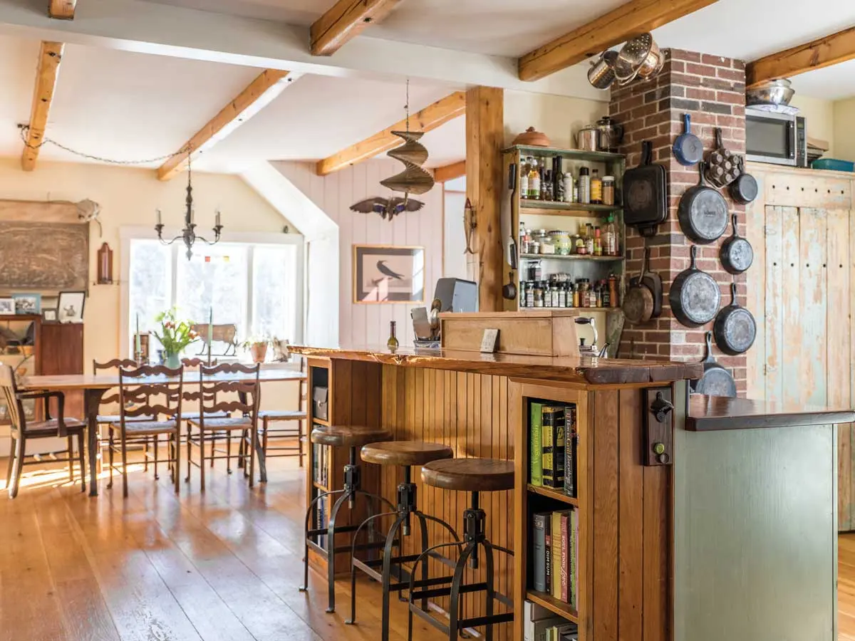 This Schoolhouse Rocks! The breakfast bar features beadboard from a Sears kit house on Pemaquid Point and a top made from pine wall framing pulled out of an 1810 house in Bristol.