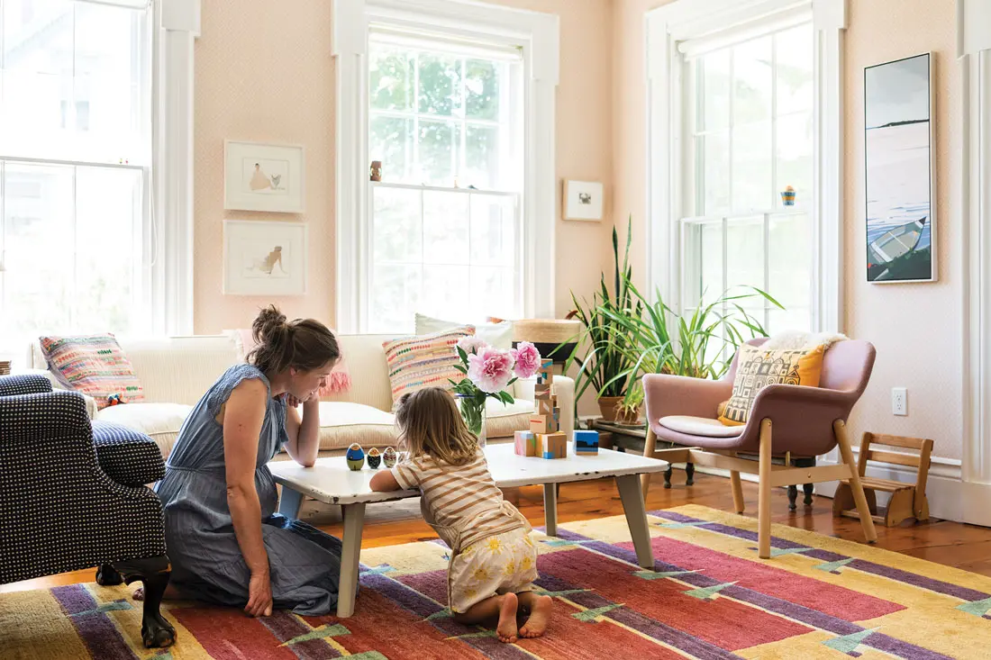 Greta Van Campen and her daughter in their Thomaston living room