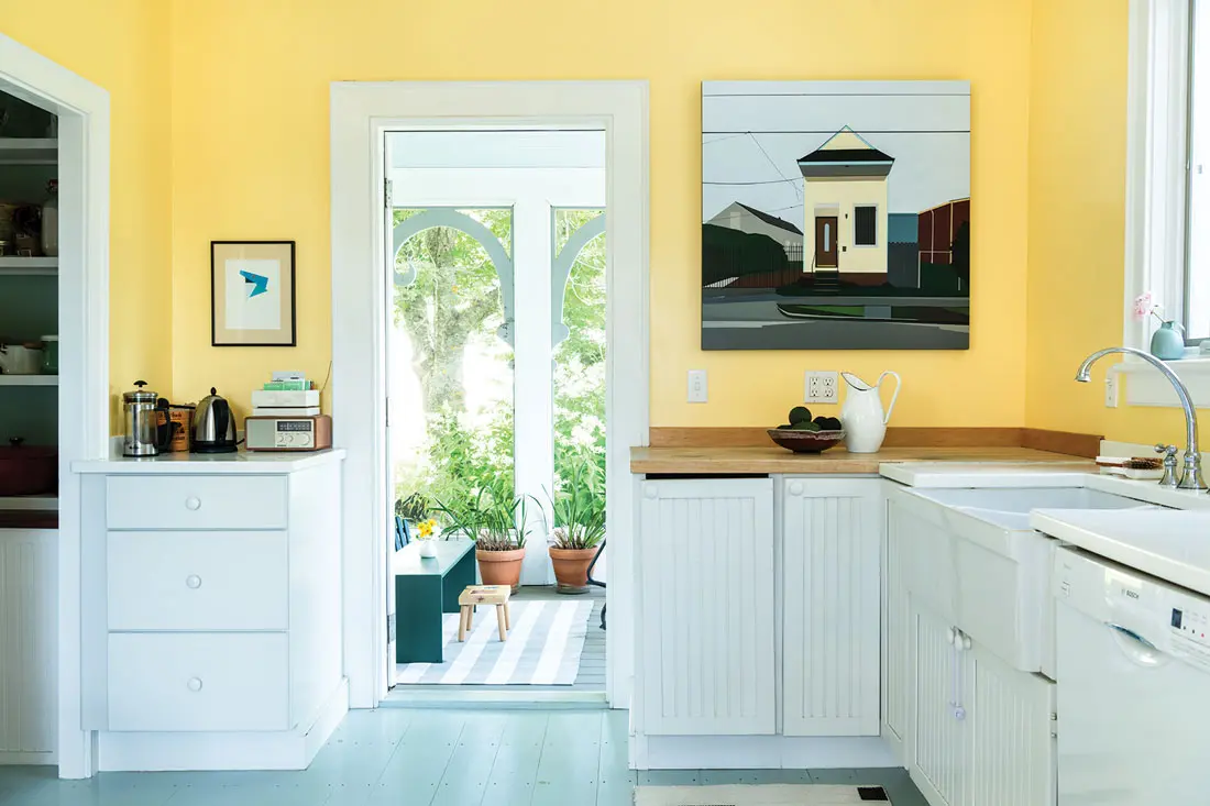 a kitchen painted Benjamin Moore’s Mellow Yellow