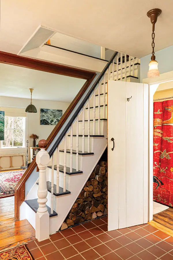 "a glorified ship’s ladder" serves as the steep staircase connecting the first and second floor