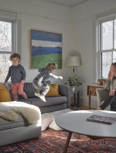 a nine-and-a-half-foot ceiling, large south-facing windows, and, unlike much of the house, decorative trim in the living room of the suspected former boarding house