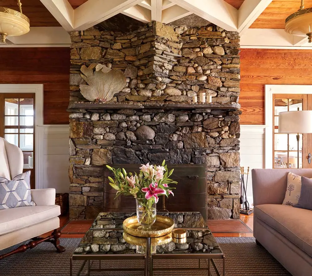 ClapboardIsland_1 fieldstone living room fireplace is one of 13 in the 1898 Clapboard Island estate