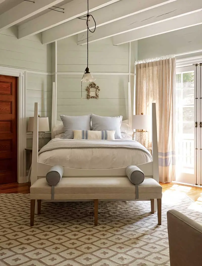 This serene second-floor bedroom is one of 13 in the estate.