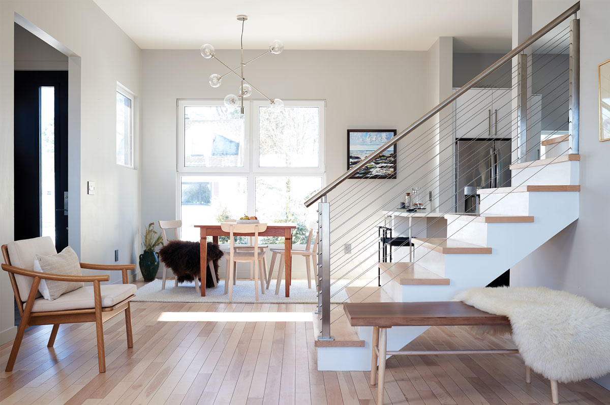 Chairs from Portland’s Chilton and Kennebunkport’s Huston & Company furnish the open kitchen/dining space.