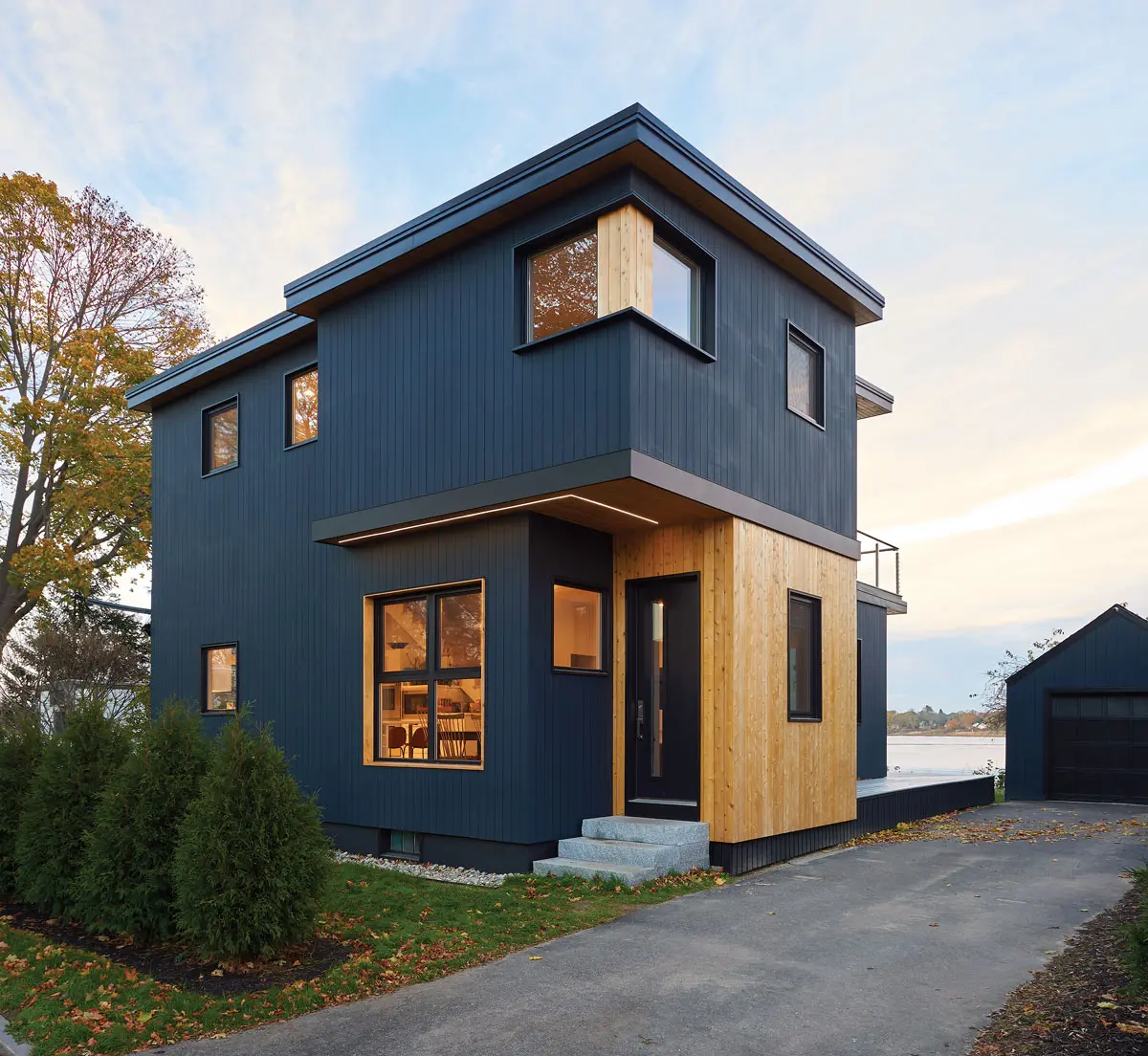 Working with the foundation and framing of an existing Cape, Portland architectural designer Chris Herlihy created a cubist ode with an airy new plan.