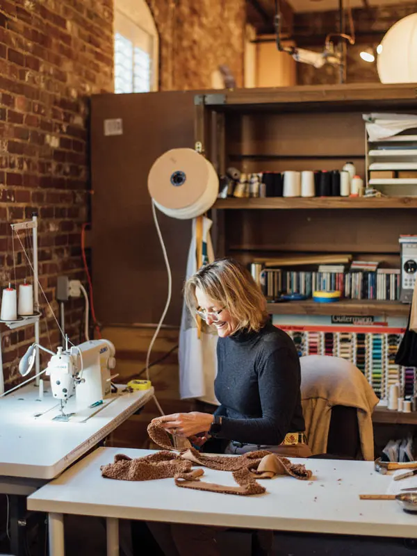 Home Remedies upholsterer working on a custom project