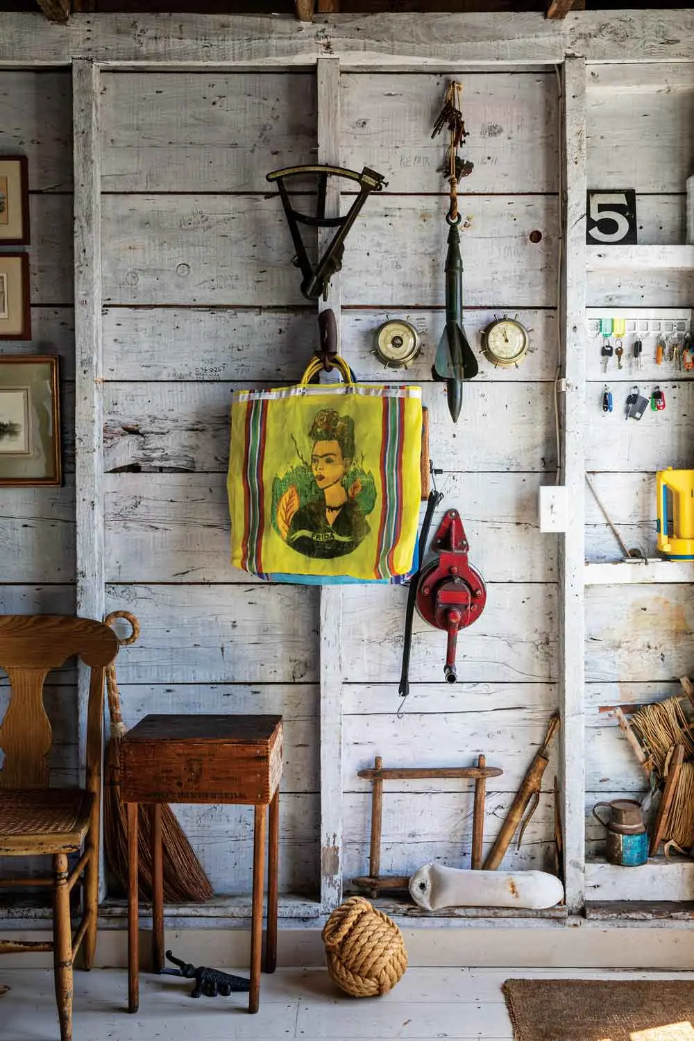 Some of the couple’s beloved objects hang between studs