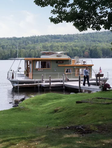 Previously ivory with aluminum trim, Nomad now sports soothing gray-green paint and warm cedar woodwork