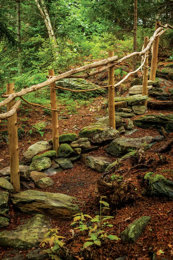 stone steps and branch railing