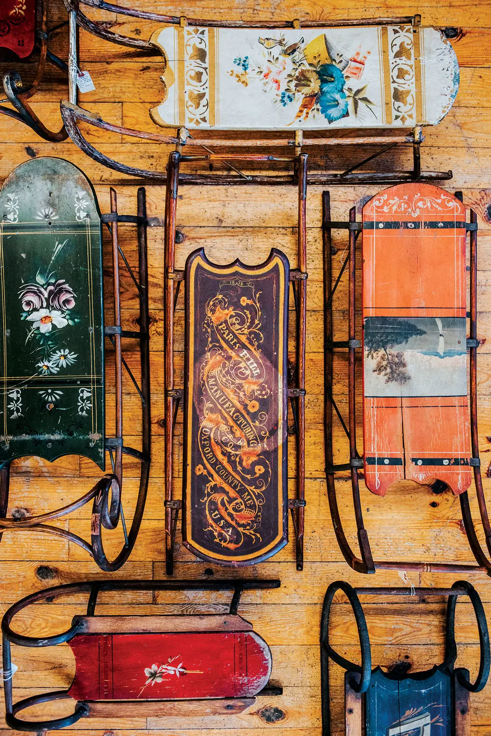 MH1912_collect_top a wall of Victorian painted sleds