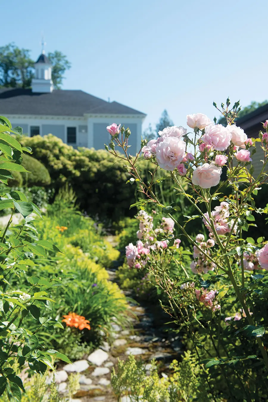 Jim used cobblestones salvaged from a railroad yard to build the sunken-garden’s path.