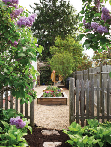 the fenced garden area at the Willard Gallery in South Portland, Maine