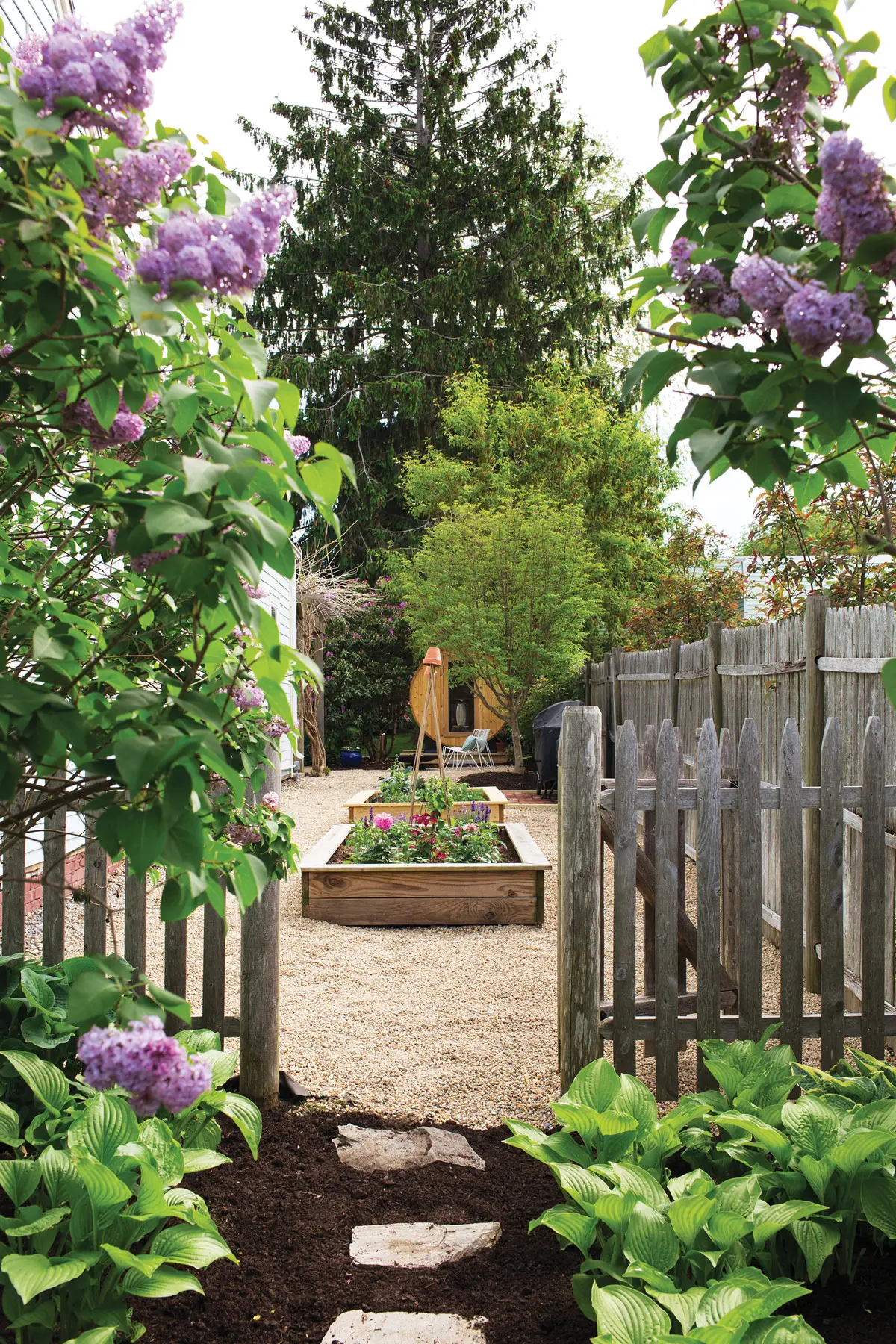 the fenced garden area at the Willard Gallery in South Portland, Maine