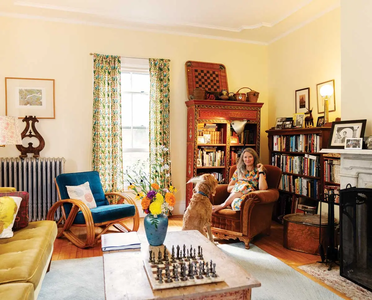 For a Writer and Her Little Brood, a Sprawling Brunswick Home Is the Perfect Fit Writer Mary Pols and Gryff relax in the fancier of the two living rooms in her 19th-century Brunswick home.