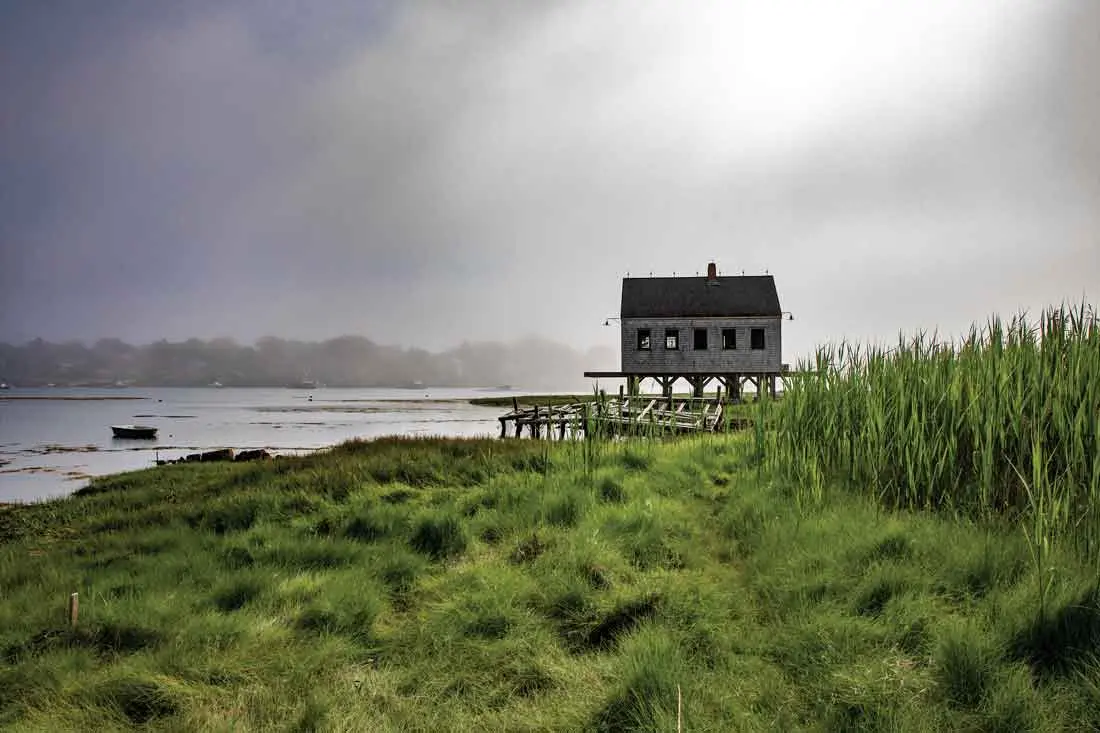 Bob Zuke salvaged the lightning rods atop his reconstructed Cape Porpoise fishing shack from a nearby town. “I was going for that Hardy Boys mystique,” he says.